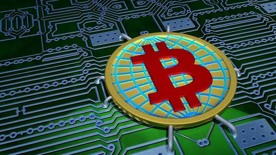 Bitcoin closeup on circuit board image